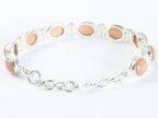 Zware zilveren armband met perzik maansteen afbeelding 2