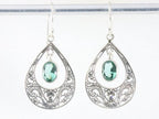 Opengewerkte zilveren filigrein oorbellen met groene toermalijn afbeelding 3