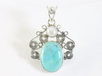 Opengewerkte zilveren hanger met Mohave turkoois en parel afbeelding 4