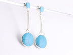 Lange ronde zilveren oorstekers met blauwe turkoois afbeelding 2