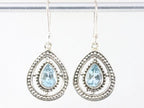 Opengewerkte zilveren oorbellen met blauwe topaas afbeelding 3