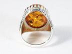 Zware bewerkte zilveren ring met amber afbeelding 3