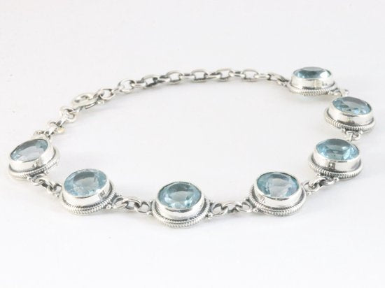 Bewerkte zilveren armband met blauwe topaas afbeelding 2