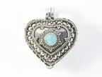 Traditioneel bewerkt hartvormig zilveren medaillon met aquamarijn afbeelding 4