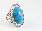 Grote opengewerkte zilveren ring met met blauwe turkoois afbeelding 1