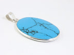 Ovale zilveren hanger met blauwe turkoois afbeelding 2