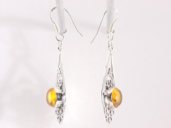 Lange opengewerkte zilveren oorbellen met amber afbeelding 2