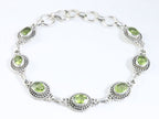 Bewerkte zilveren armband met peridoot afbeelding 1