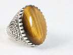 Zware bewerkte zilveren ring met tijgeroog afbeelding 1