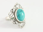 Opengewerkte zilveren ring met turkoois afbeelding 1