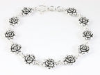 Zware zilveren armband met roosjes afbeelding 1