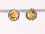 Fijne bewerkte ronde zilveren oorstekers met amber afbeelding 1