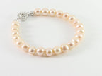 Armband met natuurlijke roze zoetwater parels en zilveren sluiting afbeelding 2