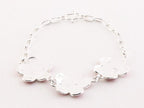 Zilveren schakelarmband met witte emaille bloemen afbeelding 3
