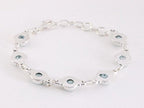 Bewerkte zilveren schakelarmband met blauwe topaas afbeelding 3