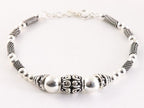 Zilveren armband met bewerkte kralen afbeelding 1