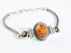 Bewerkte zilveren armband met amber en rookkwarts afbeelding 2