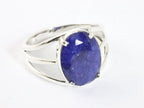 Opengewerkte zilveren ring met blauwe saffier afbeelding 1
