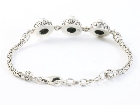 Traditionele bewerkte zilveren armband met larimar en koningsschakels afbeelding 3