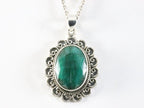 Grote bewerkte zilveren hanger met smaragd aan ketting afbeelding 4
