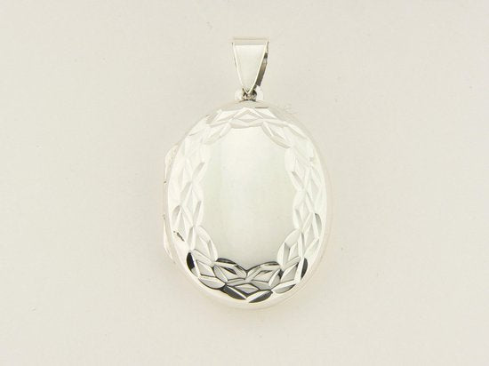 Ovaal bewerkt zilveren medaillon afbeelding 4