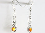 Lange opengewerkte zilveren oorbellen met amber afbeelding 2