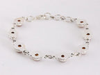 Bewerkte zilveren schakelarmband met amber afbeelding 3