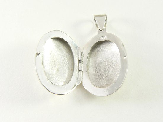 Ovaal bewerkt zilveren medaillon afbeelding 5