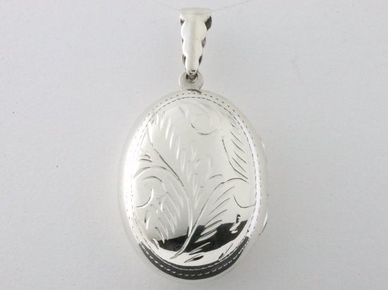 Groot ovaal bewerkt zilveren medaillon afbeelding 3