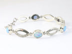 Traditionele bewerkte zilveren armband met Australische opaal afbeelding 2