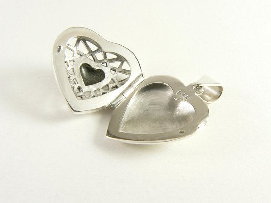 Opengewerkt hartvormig zilveren medaillon met abalone schelp afbeelding 4