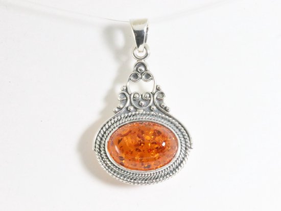 Bewerkte zilveren hanger met amber afbeelding 4