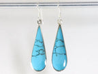 Lange druppelvormige zilveren oorbellen met blauwe turkoois afbeelding 3