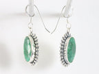 Bewerkte zilveren oorbellen met smaragd afbeelding 2