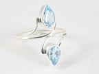 Fijne zilveren ring met blauwe topaas afbeelding 1