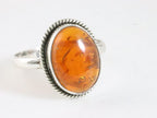 Bewerkte ovale zilveren ring met amber afbeelding 1