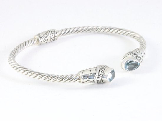 Traditionele bewerkte zilveren klemarmband met blauwe topaas afbeelding 2