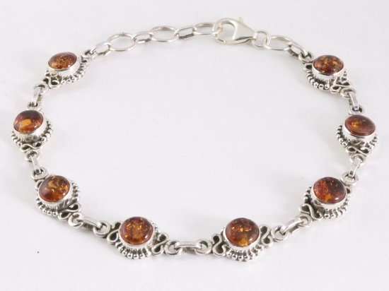 Bewerkte zilveren schakelarmband met amber afbeelding 1