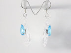 Opengewerkte zilveren oorbellen met blauwe topaas afbeelding 2