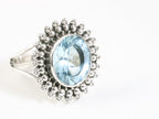 Bewerkte zilveren ring met blauwe topaas afbeelding 1