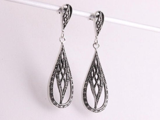 Lange opengewerkte zilveren oorstekers afbeelding 2