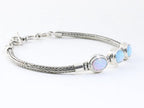 Traditionele zilveren snake armband met Australische opaal afbeelding 2