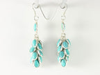 Trosvormige zilveren oorbellen met turkoois afbeelding 2