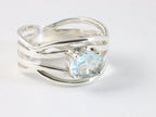 Opengewerkte zilveren ring met blauwe topaas afbeelding 1