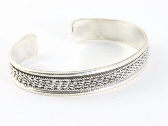 Zilveren klemarmband met vlechtmotief en kabelpatronen afbeelding 1