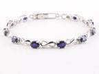 Zilveren tennisarmband met blauwe saffier afbeelding 1