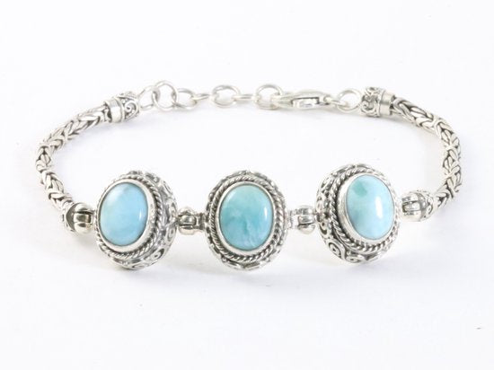 Traditionele bewerkte zilveren armband met larimar en koningsschakels afbeelding 1