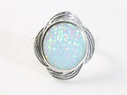 Bewerkte zilveren ring met welo opaal afbeelding 4