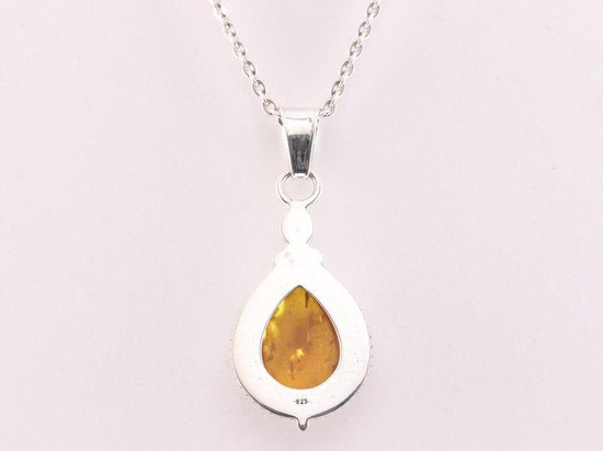 Bewerkte zilveren hanger met amber aan ketting afbeelding 3