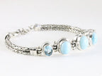 Traditionele zilveren armband met larimar, blauwe topaas en koningsschakels afbeelding 2